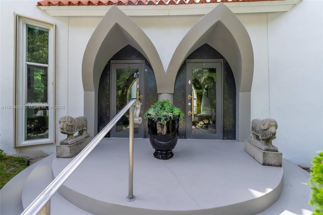 Nestled in the heart of South Miami, this Mediterranean gem is a true architectural masterpiece designed by architect Jose Anthony Enriquez.