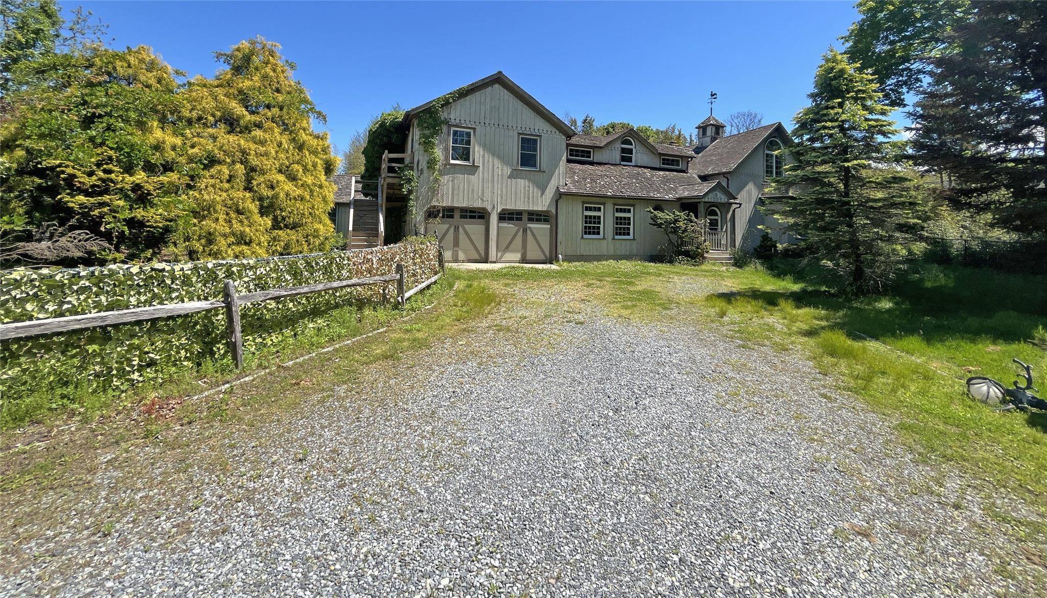 Super 5 bedroom 4 bath compound south of Montauk Hwy in Center Moriches on a cul de sac.
