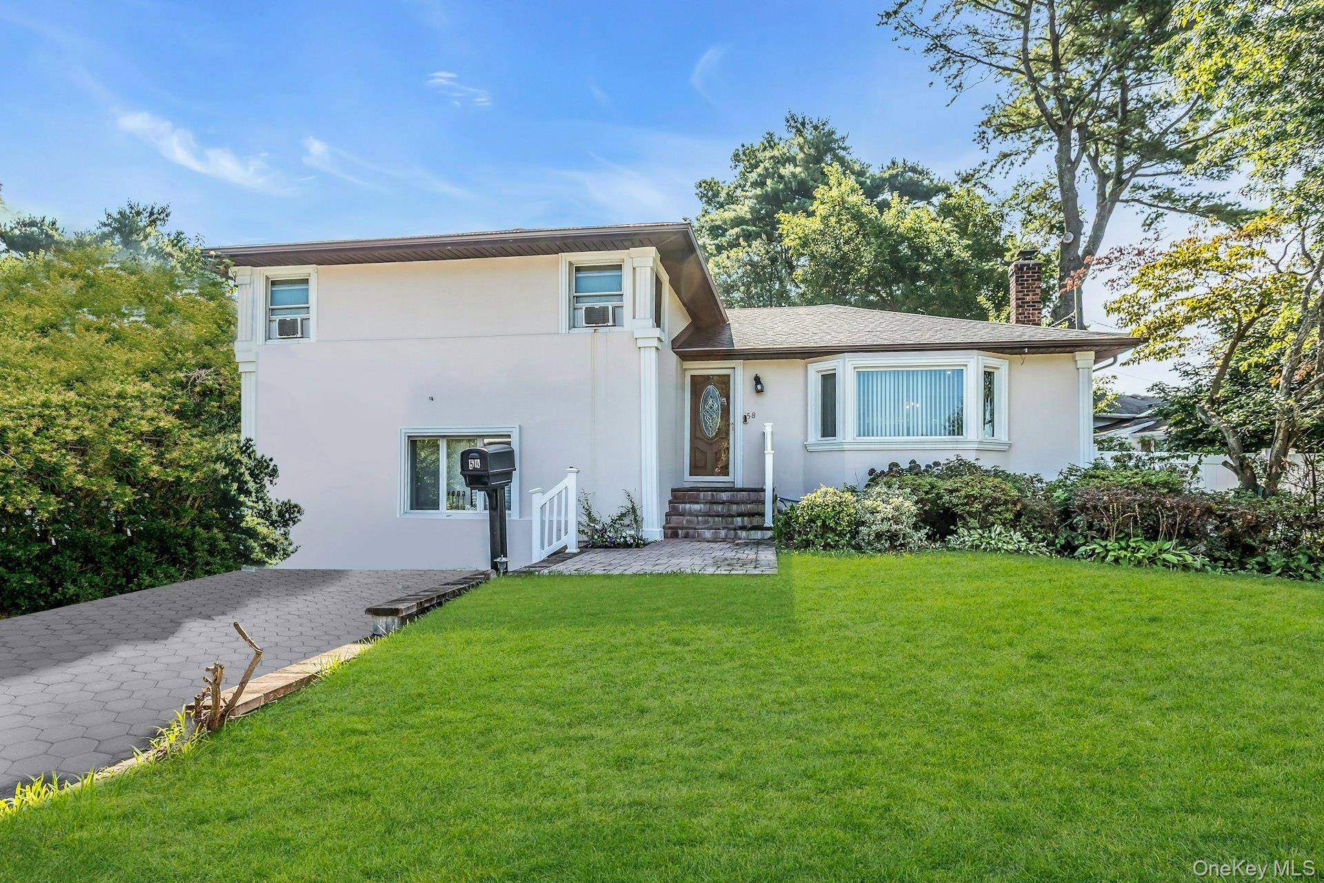 Luxe living in the heart of Plainview, this mint condition 2, 600 sq ft, 5 bedroom, 3.