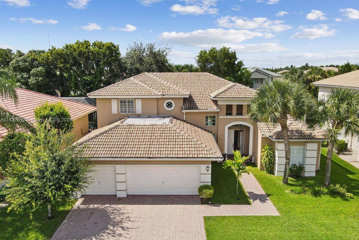 Stunning Mediterranean Style Pool Home in Wellington Shores !