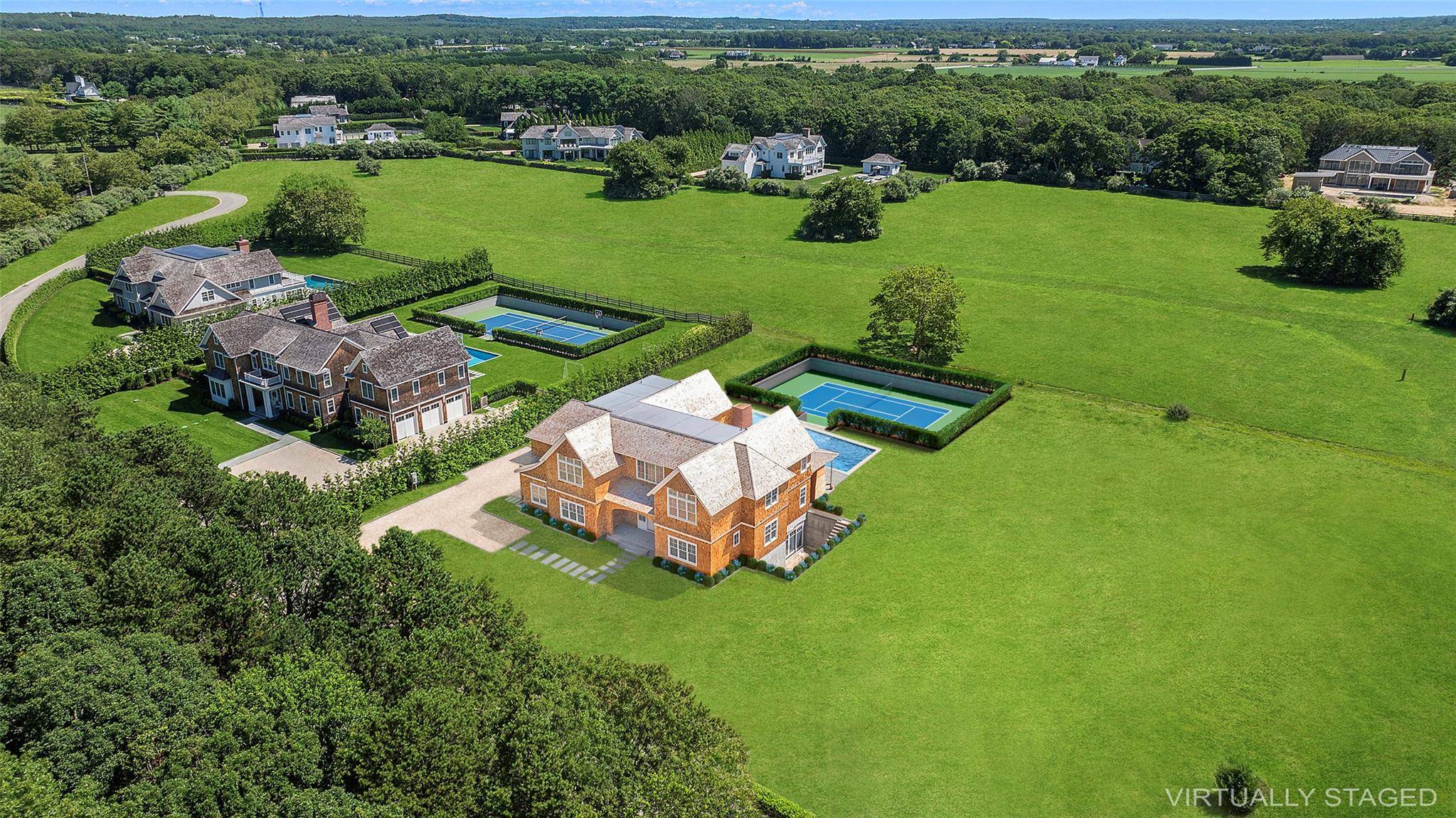 Dare to dream across nearly 19 acres in Water Mill North, where architecture, nature, and lifestyle align to create a truly rare estate.