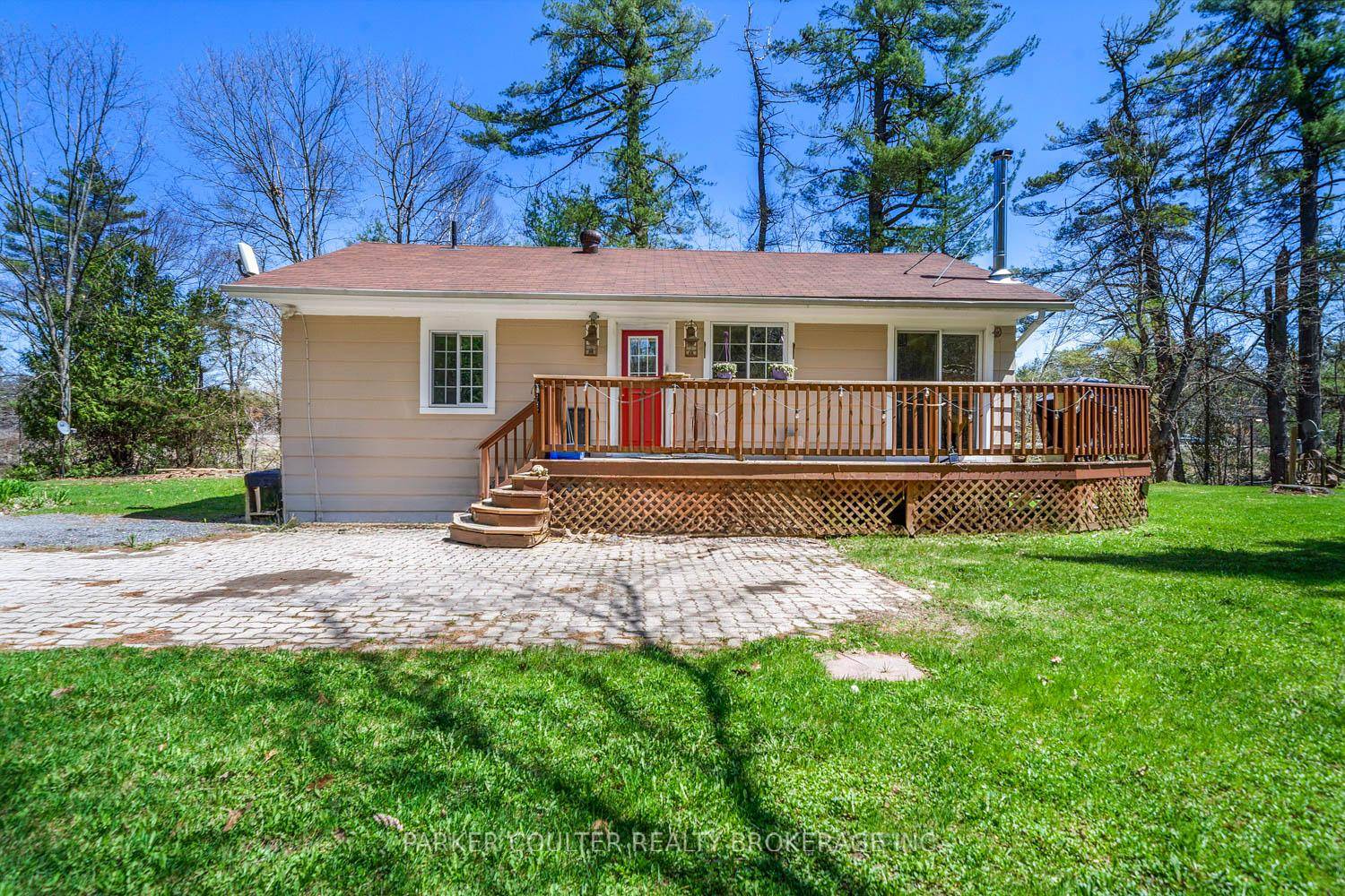Discover this charming 3 bedroom, 1 bathroom bungalow set on just under half an acre in a peaceful country setting, with quick and easy access to Highway 11.