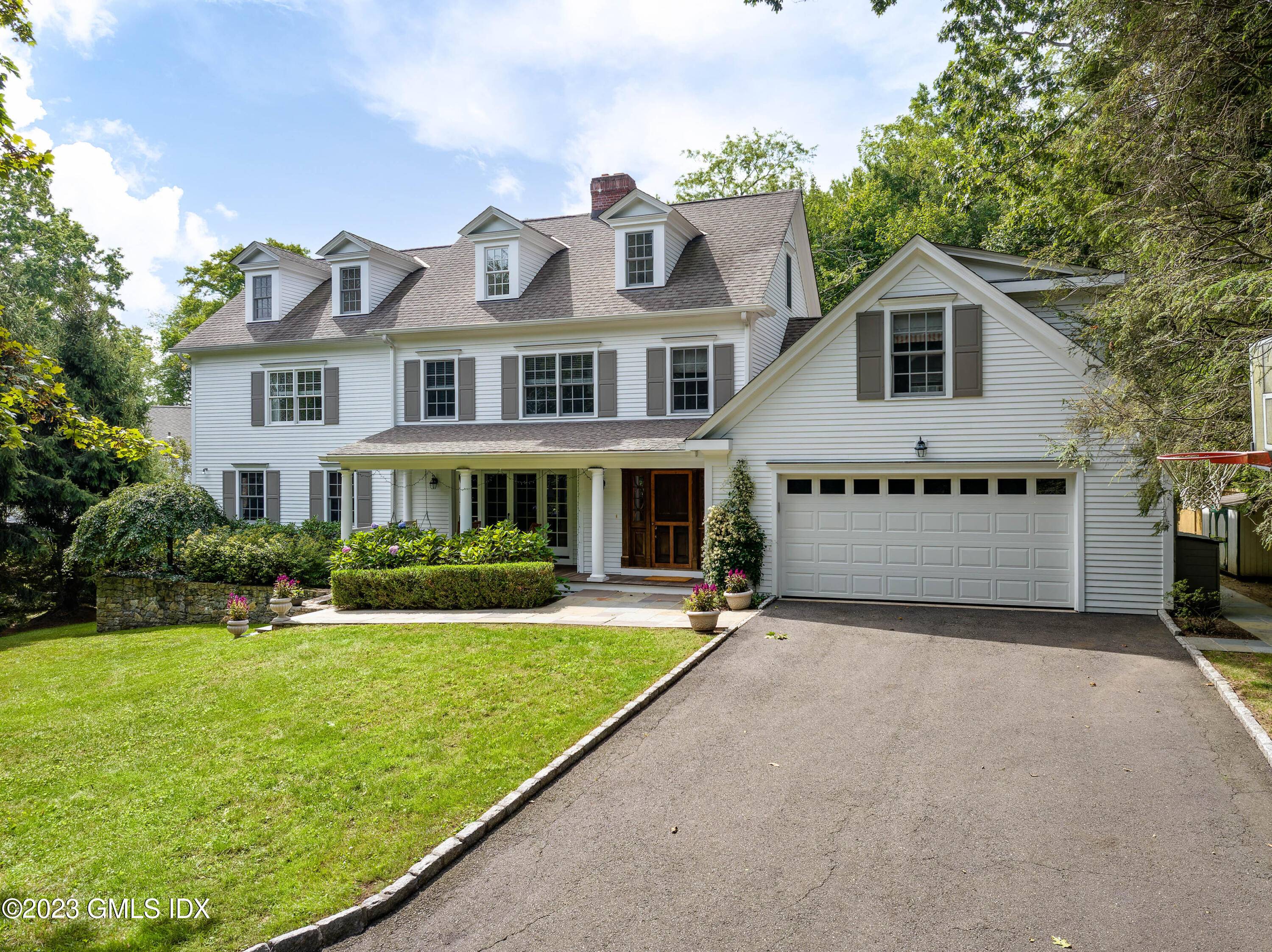 Nestled in the heart of desirable Riverside this classic colonial has it all.