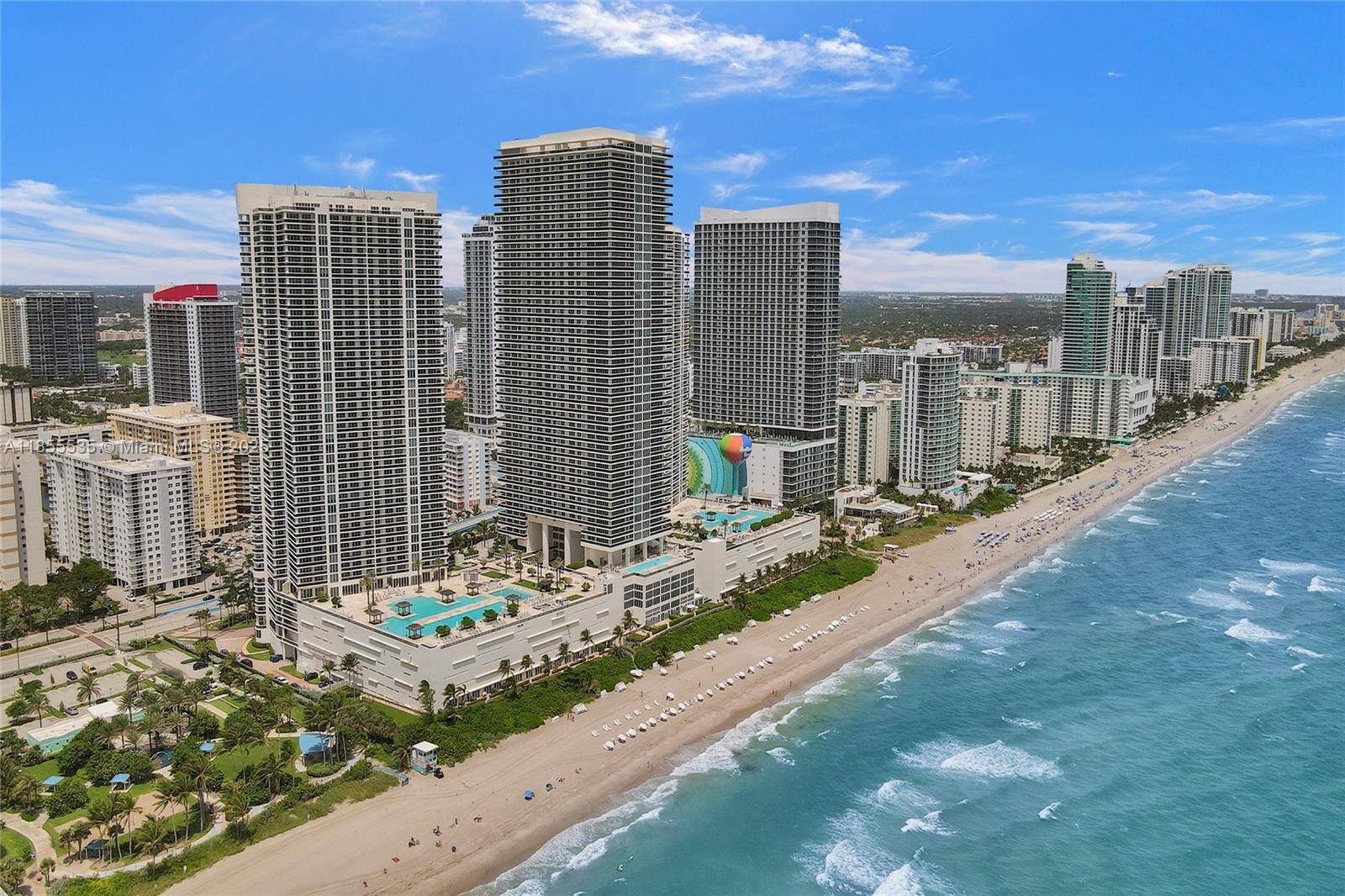 Rarely available direct ocean corner residence offering 3 bedrooms, 3.