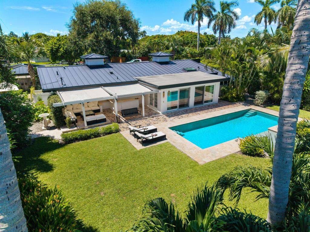 Stunning one story pool home on Lake Clarke with captivating views of the lake and Pinetree Park.