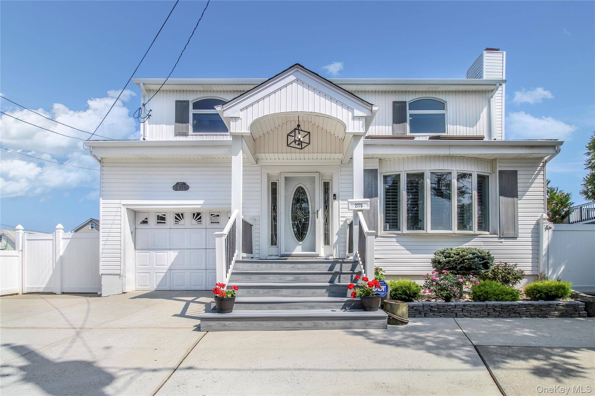 Waterfront Colonial with Stunning Decks amp ; Scenic Views !