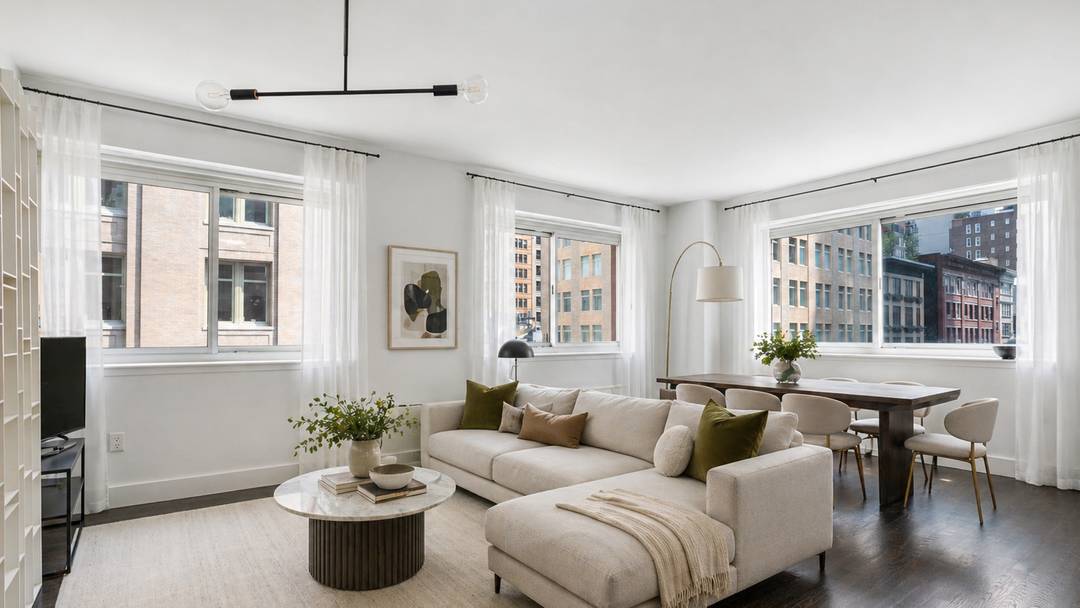 Discover refined Chelsea living in this mint condition two bedroom, two bath condominium offering 1, 348 square feet of beautifully proportioned space, with an alternative floor plan showcasing the potential ...