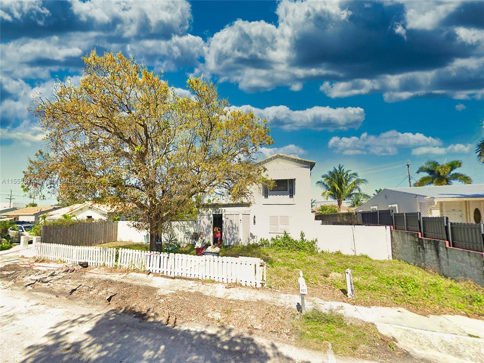 Located in the desirable East West Palm Beach area, just blocks from the Intracoastal, the double lot property at 427 Maddock Street offers a unique renovation opportunity.