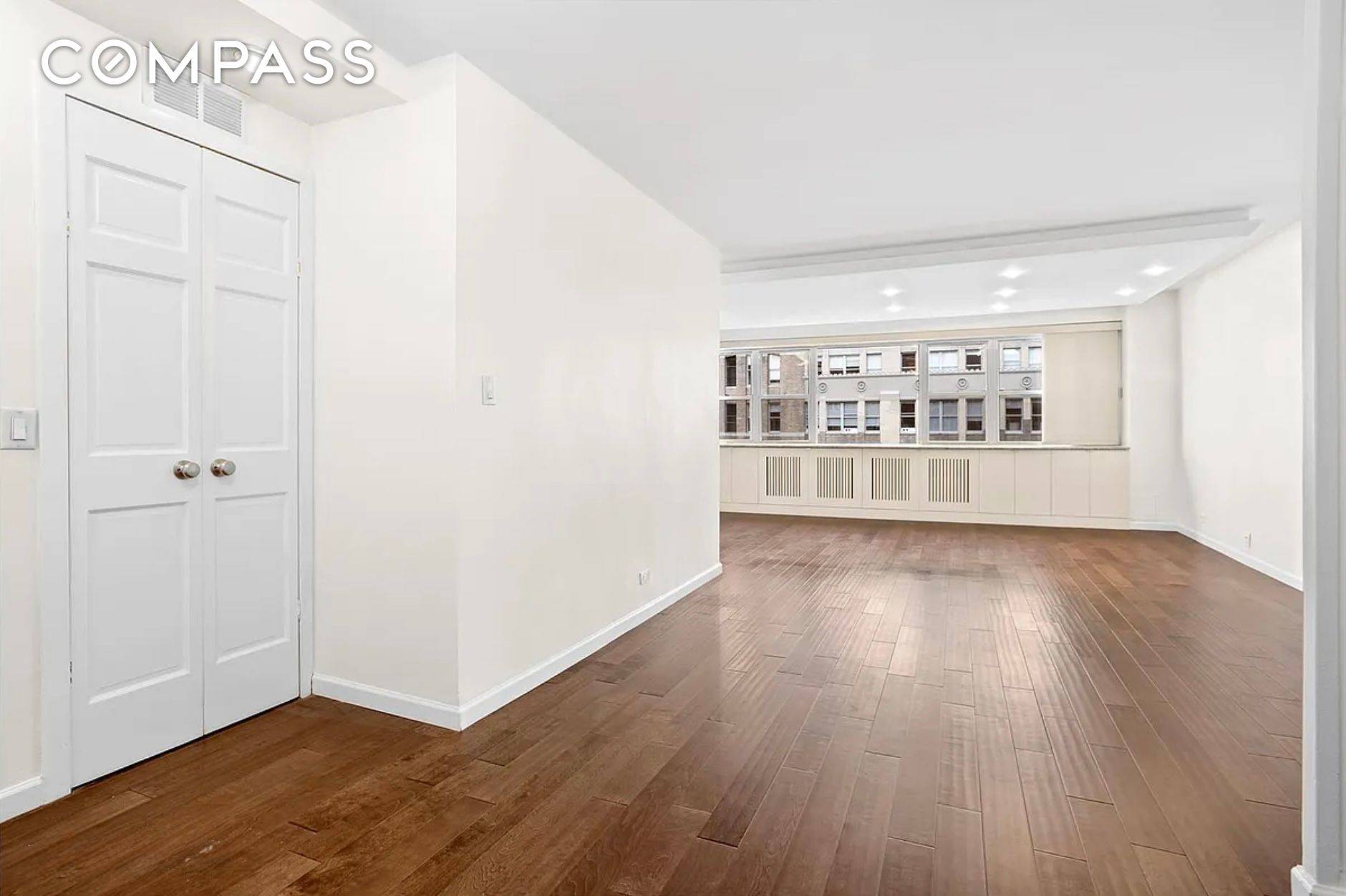 Apartment 12A in Coliseum Park designed by Sylvan and Robert Bien is a two bathroom corner unit with a 10 foot wide entry foyer with washer dryer in closet then ...