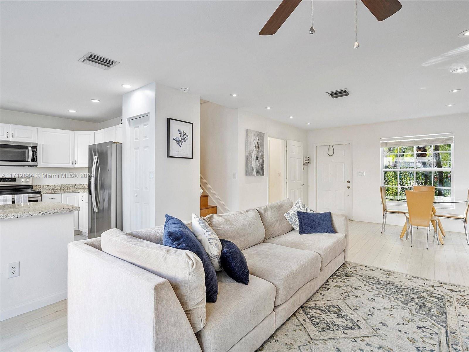 Beautifully designed 2 bedroom, 2 bathroom, and 1 car garage townhouse in the desirable gated community of Pembroke Isles offers comfort and convenience.