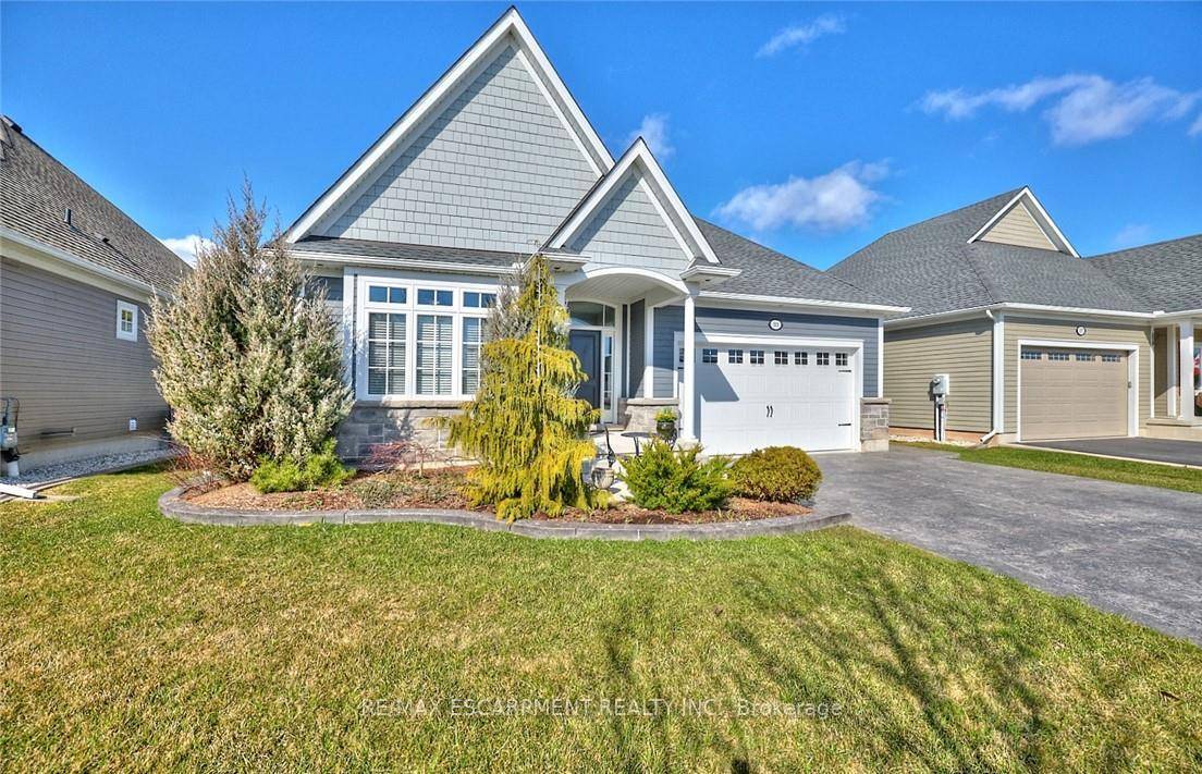 Elegance abounds in this spectacular open concept Ridgeway By The Lake bungalow.