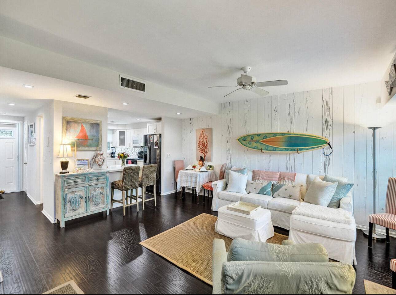 WALK ACROSS THE STREET TO THE BEACH or spend the day overlooking the private lagoon from the community dock or take a dip in the community pool !