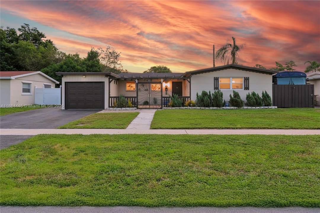 Step into this charming one story ranch style home with welcoming foyer featuring a private pool, 1 car garage, and two functional storage sheds.
