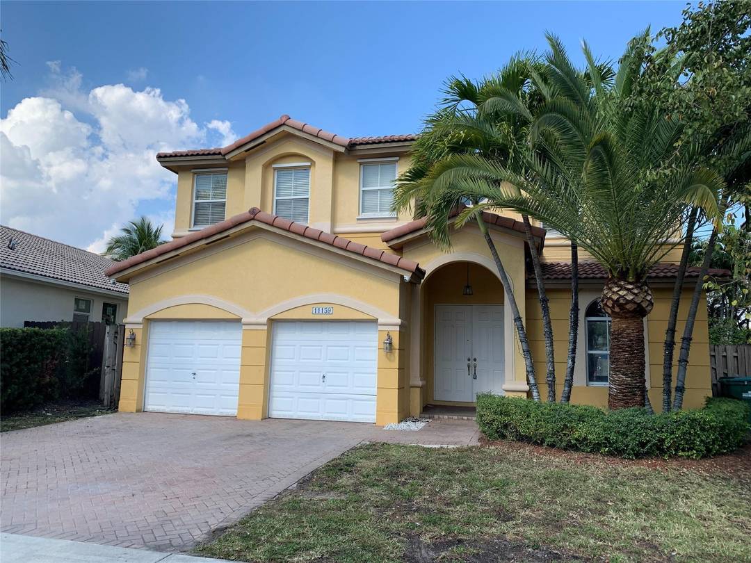 Enjoy a spacious 4 Bedroom 4 Bath home in the highly sought after Islands at Doral.