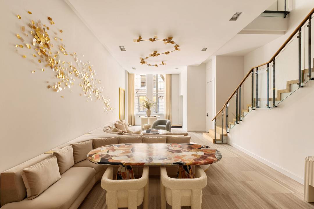 In the heart of SoHo, an AD 100 Gut Renovated mansion sized condo, with incredibly low monthlies, awaits on Spring Street.