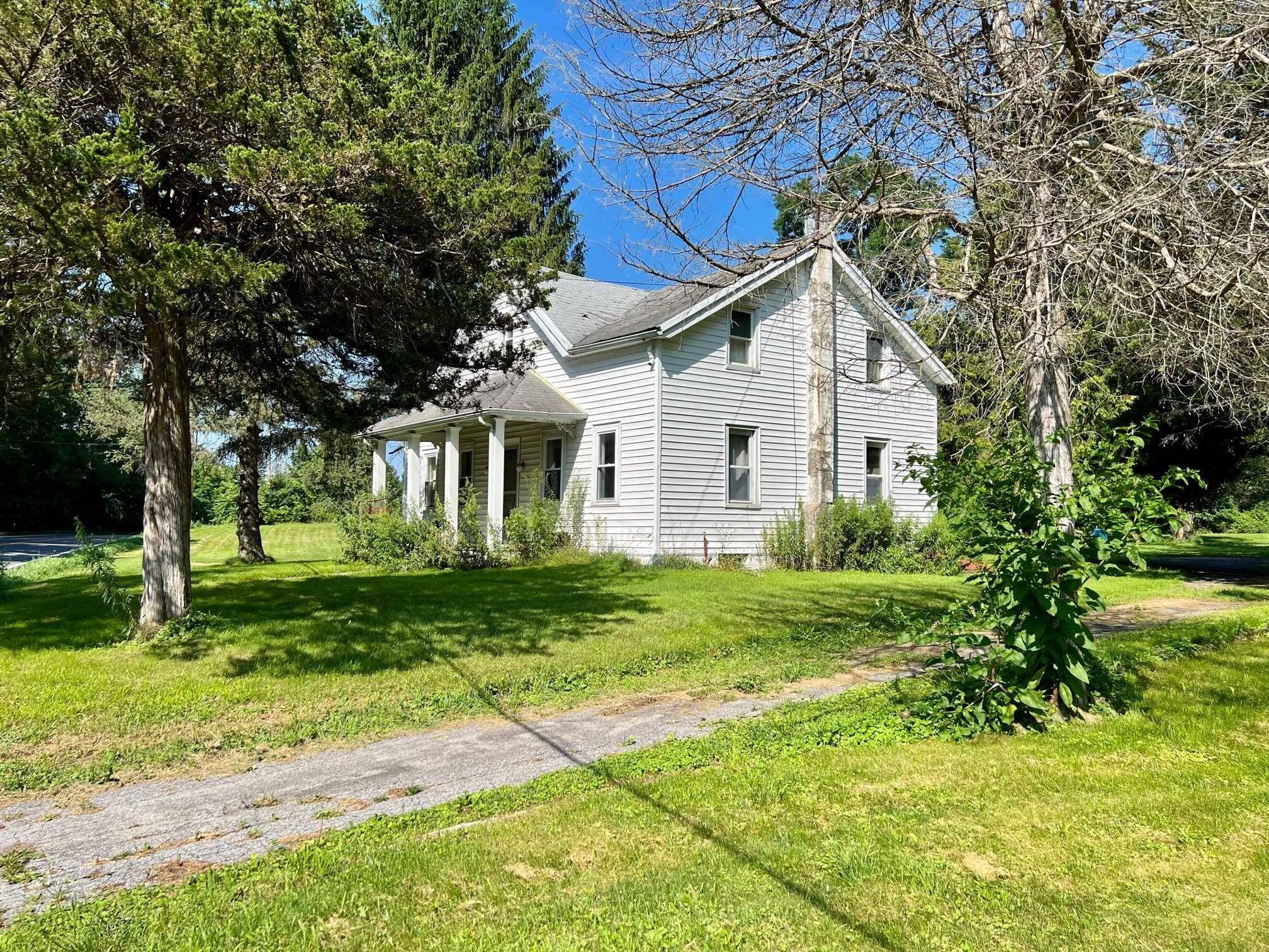 Looking for a small farmhouse with abundant land in Dutchess County ?