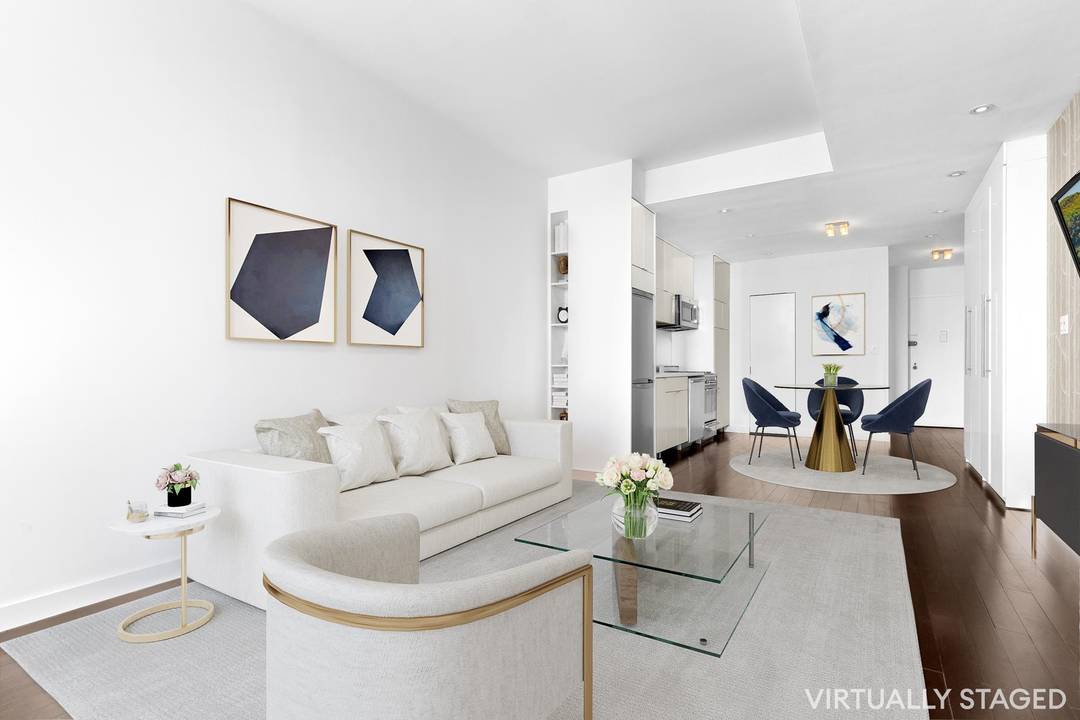 Take advantage of extremely low monthlies with this enormous, high floor view studio loft at Kheel Tower.