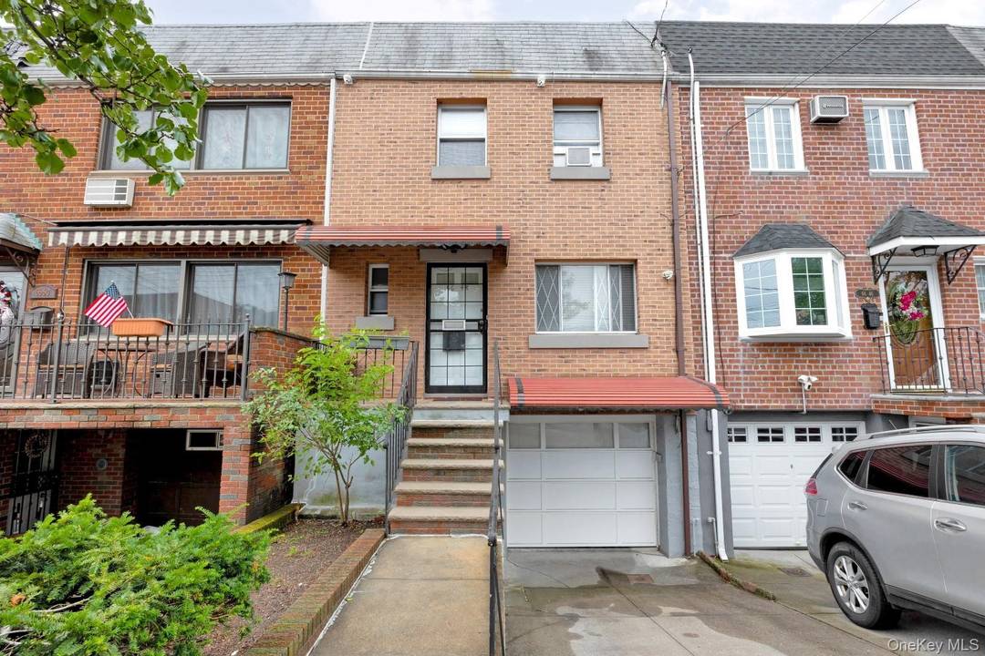 Middle Village N Move right into this rare brick side hall single family home on a quiet, tree lined street featuring 3 bedrooms and 1.