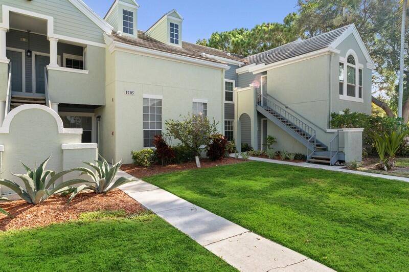 Welcome to this bright and stylish corner unit in the sought after gated community of Bahia Delray.