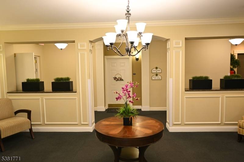 LIVE THE GRANDE LIFE ! Beautifully maintained one bedroom, one bath condo on the third floor of an elevator building with open living dining area, kitchen with breakfast bar, laundry ...