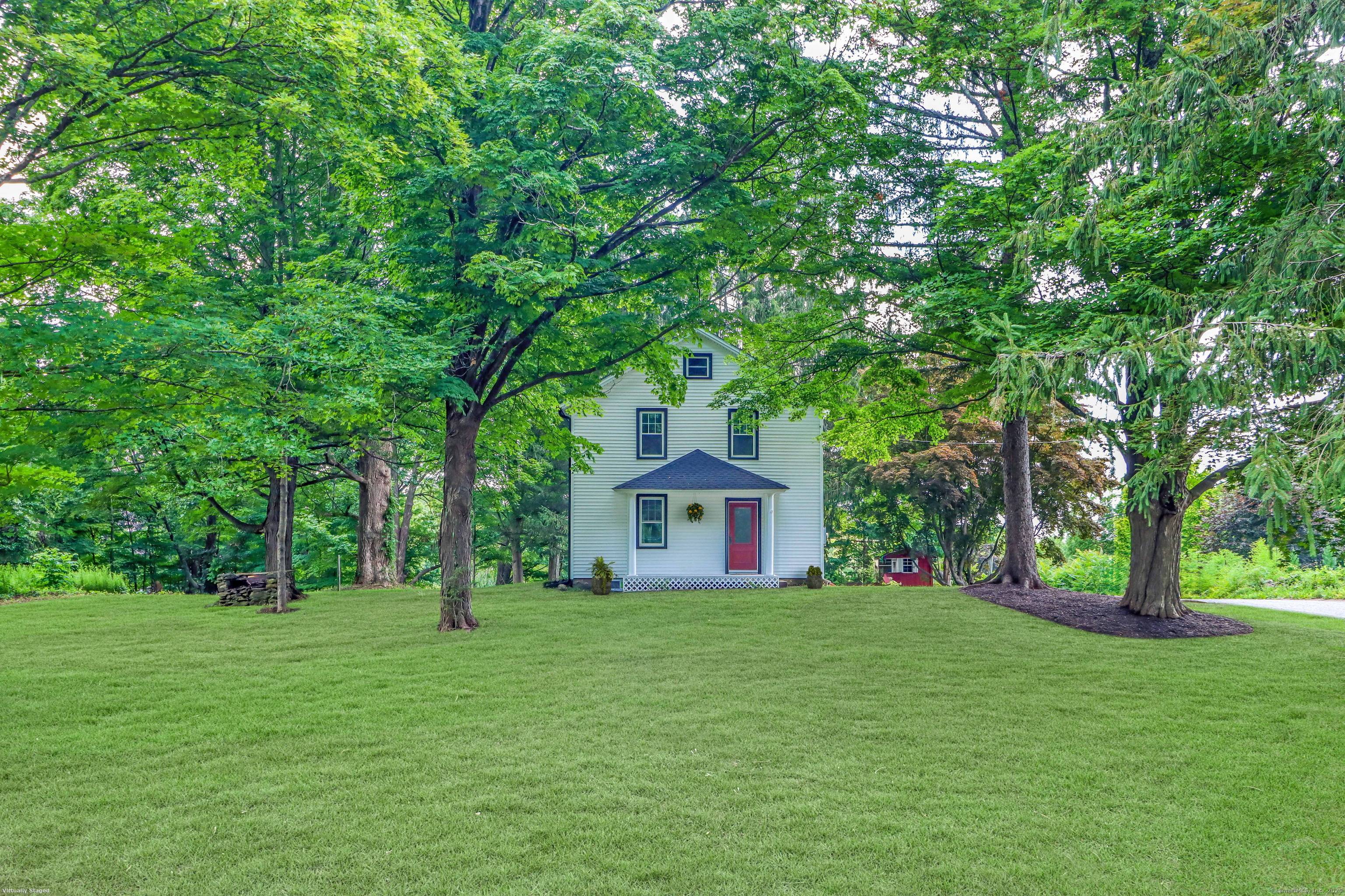 This 1930 Colonial Farmhouse defines vintage charm.