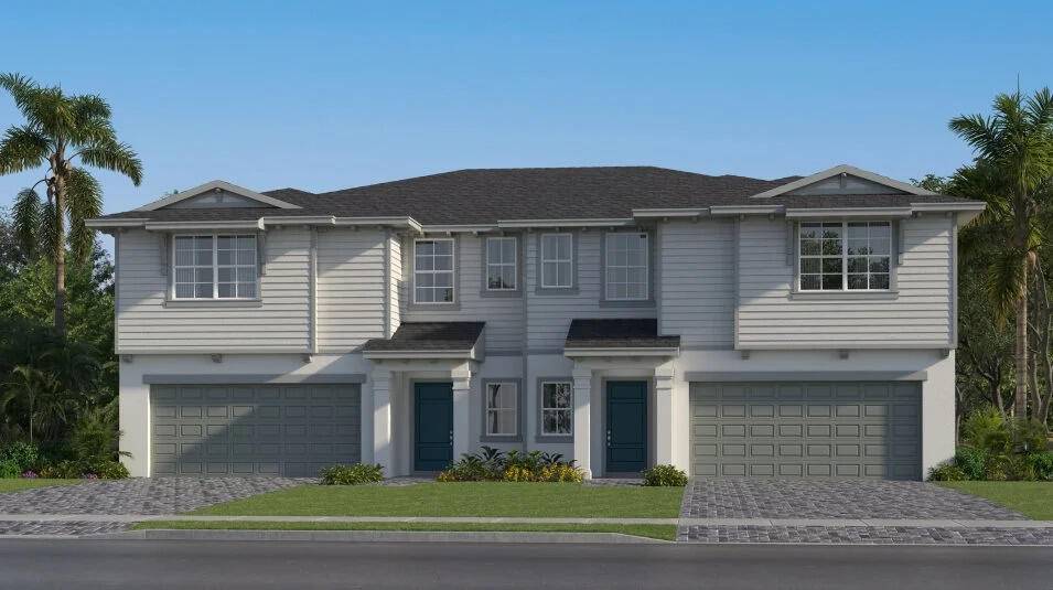 The first floor of this new two story twin home design presents the open plan main living area, which includes the spacious Great Room, a fully equipped kitchen and lovely ...