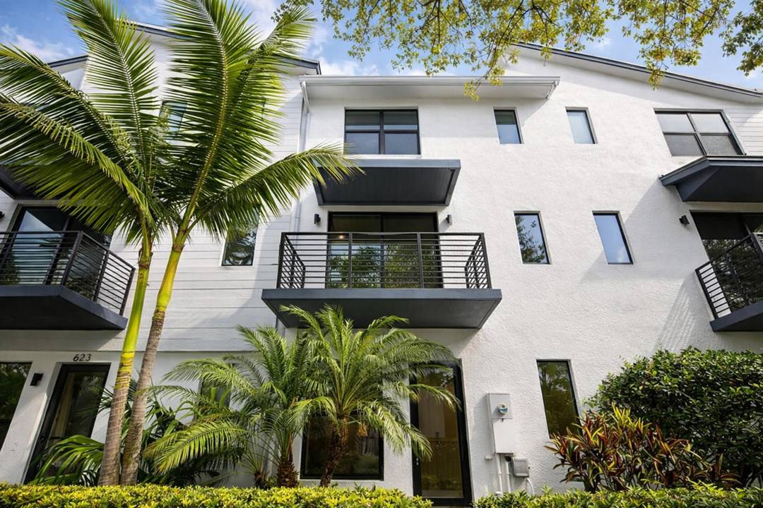 Welcome to a beautifully designed 3 story smart townhome in the heart of Wilton Manors.