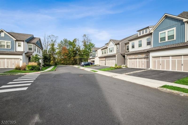 This newly built townhouse is perfectly situated on a cul de sac and you can't beat the location with the view of scenic trees.