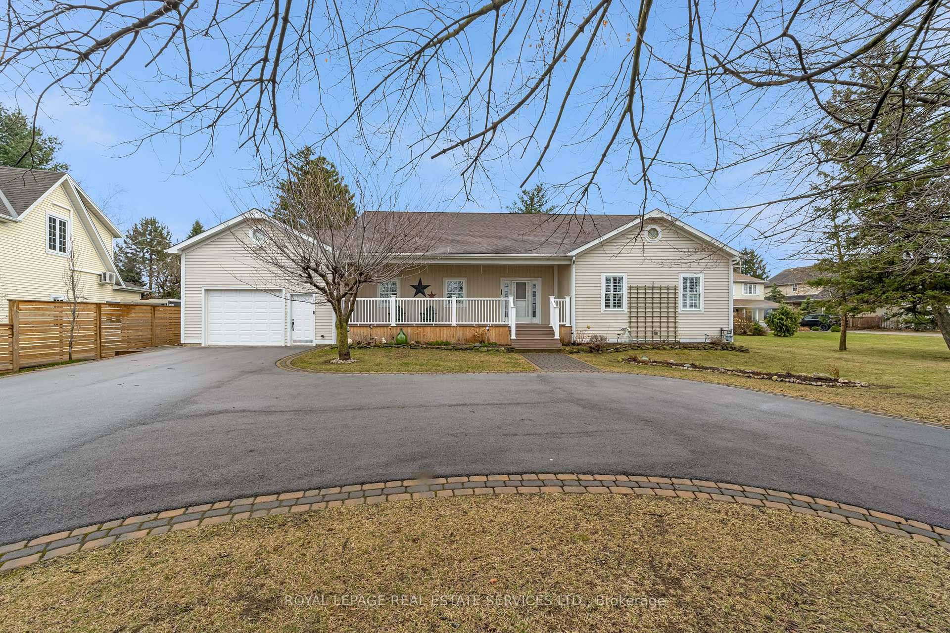 Nestled in an idyllic setting amidst picturesque vineyards, this exquisite 3 3 bedroom 2 family home offers unparalleled exclusivity in Niagara on the Lake.