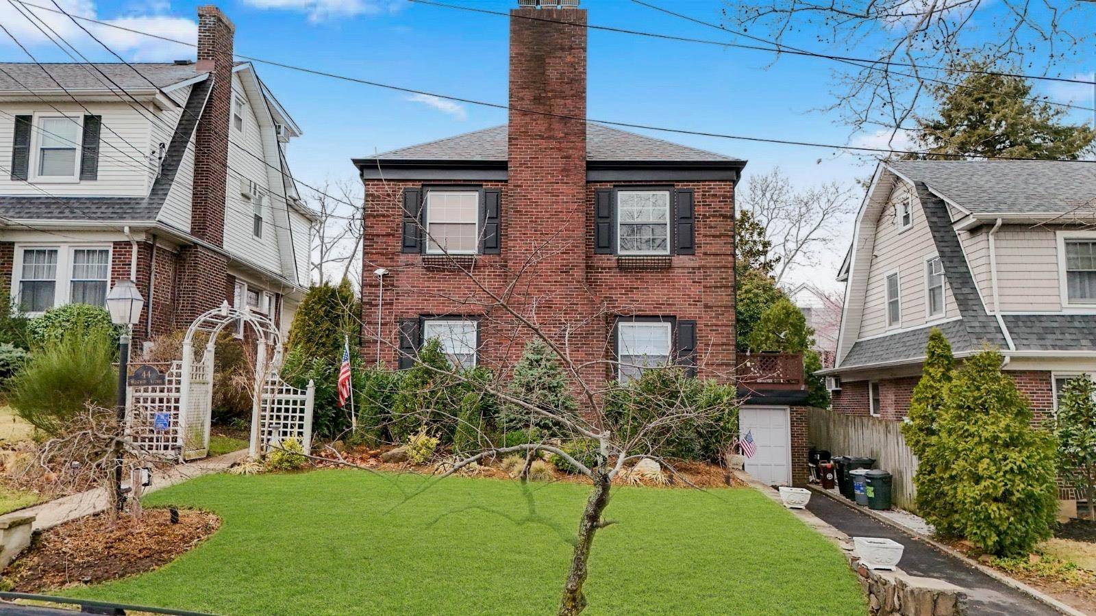 This beautifully maintained mid century Brick Center Hall Colonial in the heart of Randall Manor offers classic charm with today's amenities The welcoming center foyer is of ample size with ...