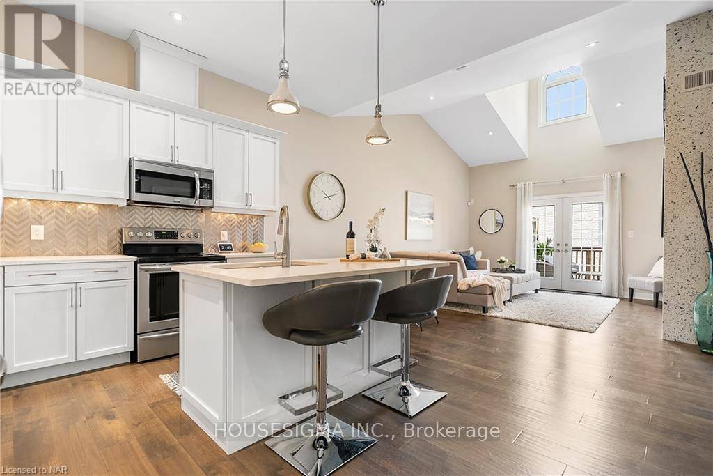 Welcome to this exquisite bungalow townhouse condominium, nestled in the highly sought after Mount Carmel community of north Niagara Falls.
