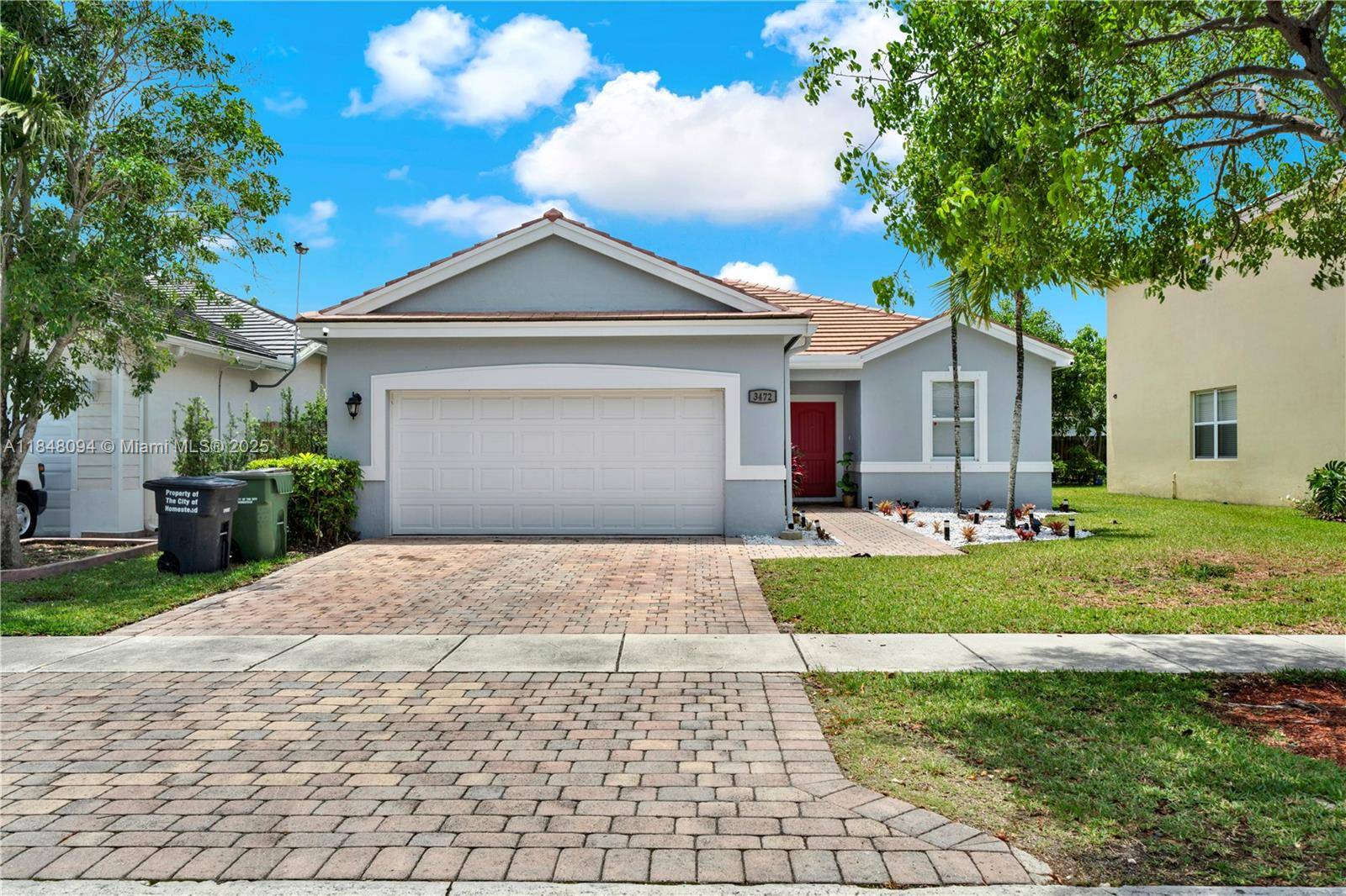 Due to relocation, this stunning home in the private and tranquil Isles od Oasis community is ready for its next owners.