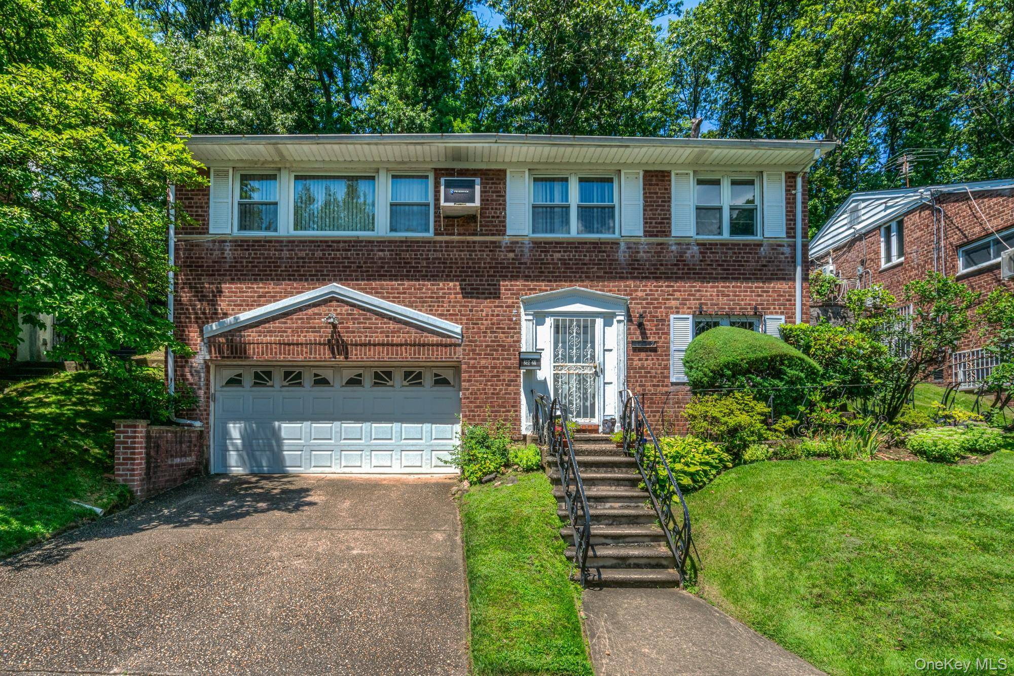 Welcome to this well maintained, original owner split level home, proudly offered for the first time ever in the highly desirable Parkside Hills section of Queens Village.