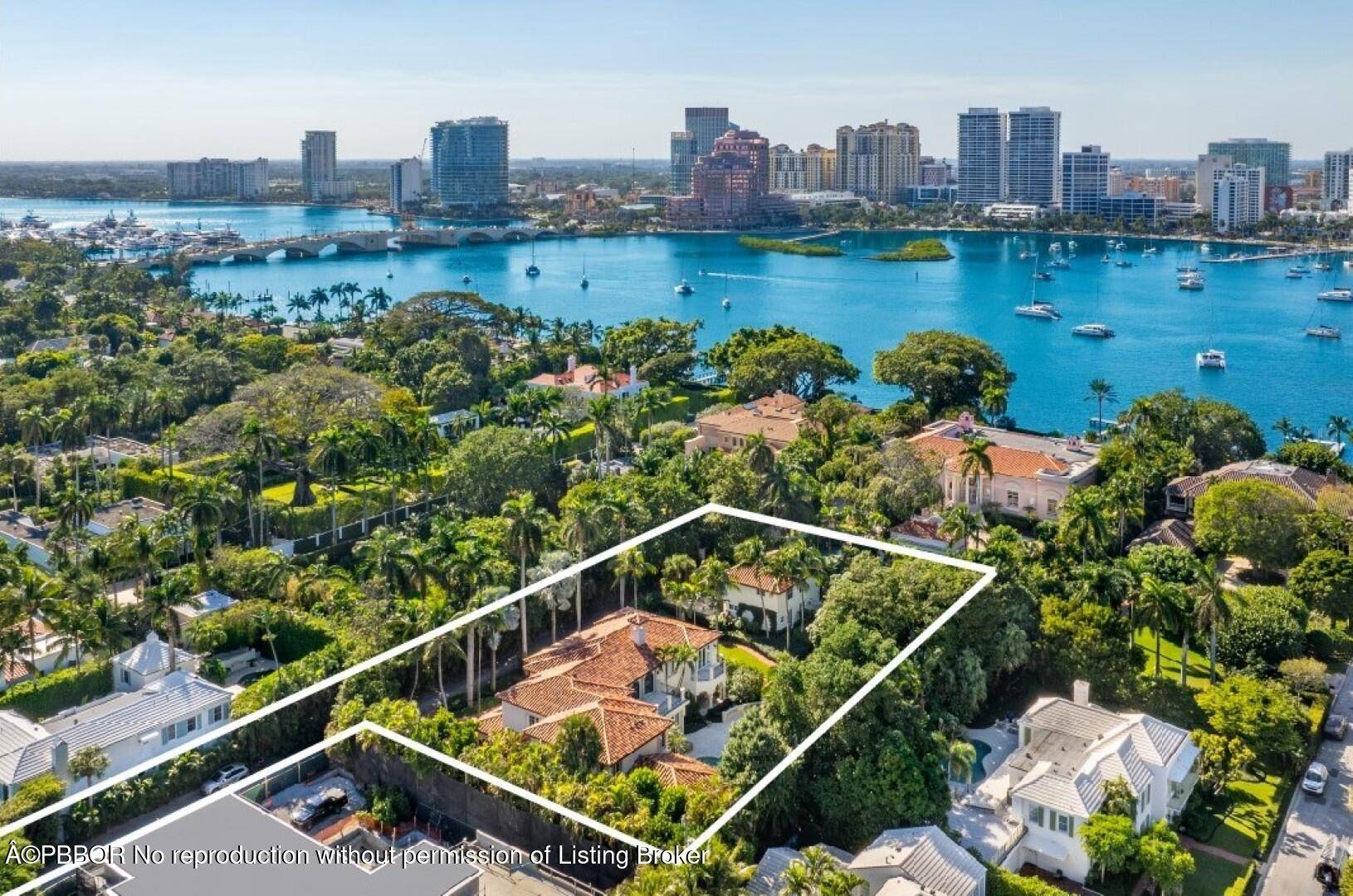 Fantastic In Town Estate on oversized 1 acre lot, just one house from the Lake Trail.