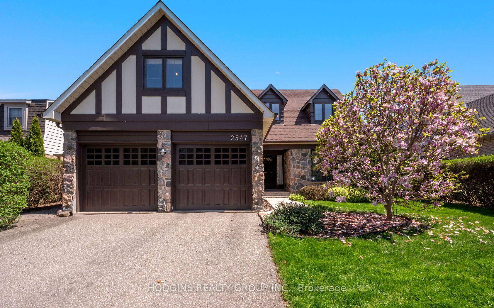 Rare Cape Cod Tudor style 5 bdrm home on one of Sherwood Forrest's most sought after streets.