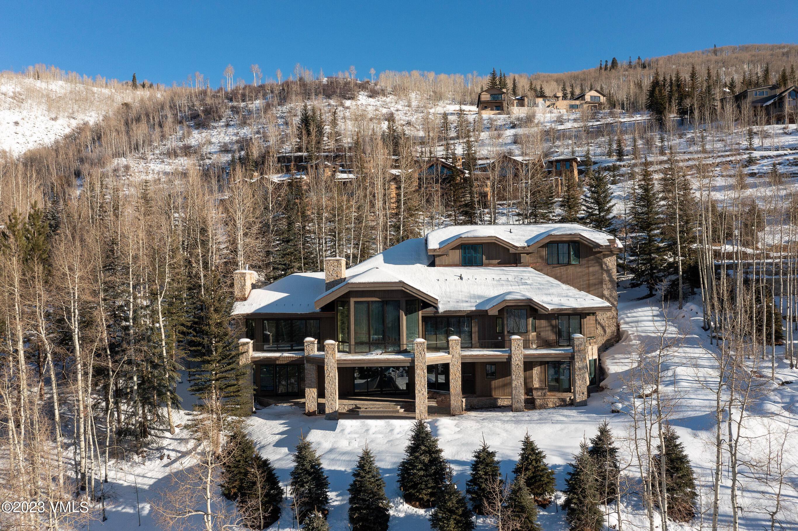 Situated in Vail's most exclusive gated community, boasting sprawling panoramic views of Vail Mountain, sits 1058 Riva Glen.