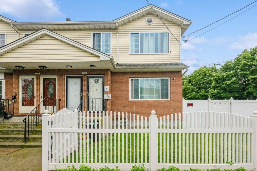 Nestled on a picturesque tree lined street just minutes from the beach, this beautifully maintained, multi family corner property is the perfect family retreat.