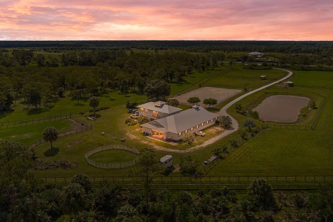 Set on 21. 59 acres approximately 15 usable within the gated equestrian community of Trailside, this property offers a rare, turnkey equestrian estate.