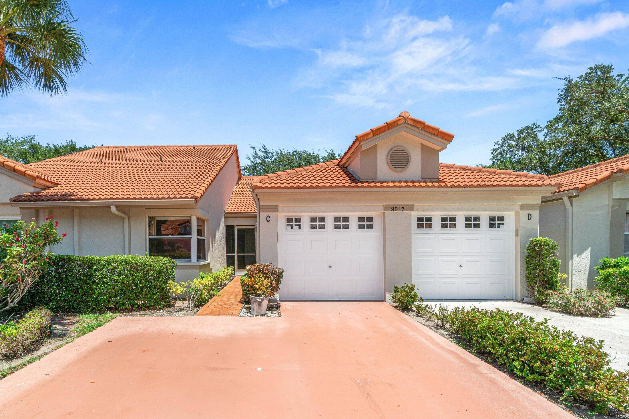 LOVELY 2 BR 2 BA 1 CAR GARAGE VILLA IN A 55 COMMUNITY.