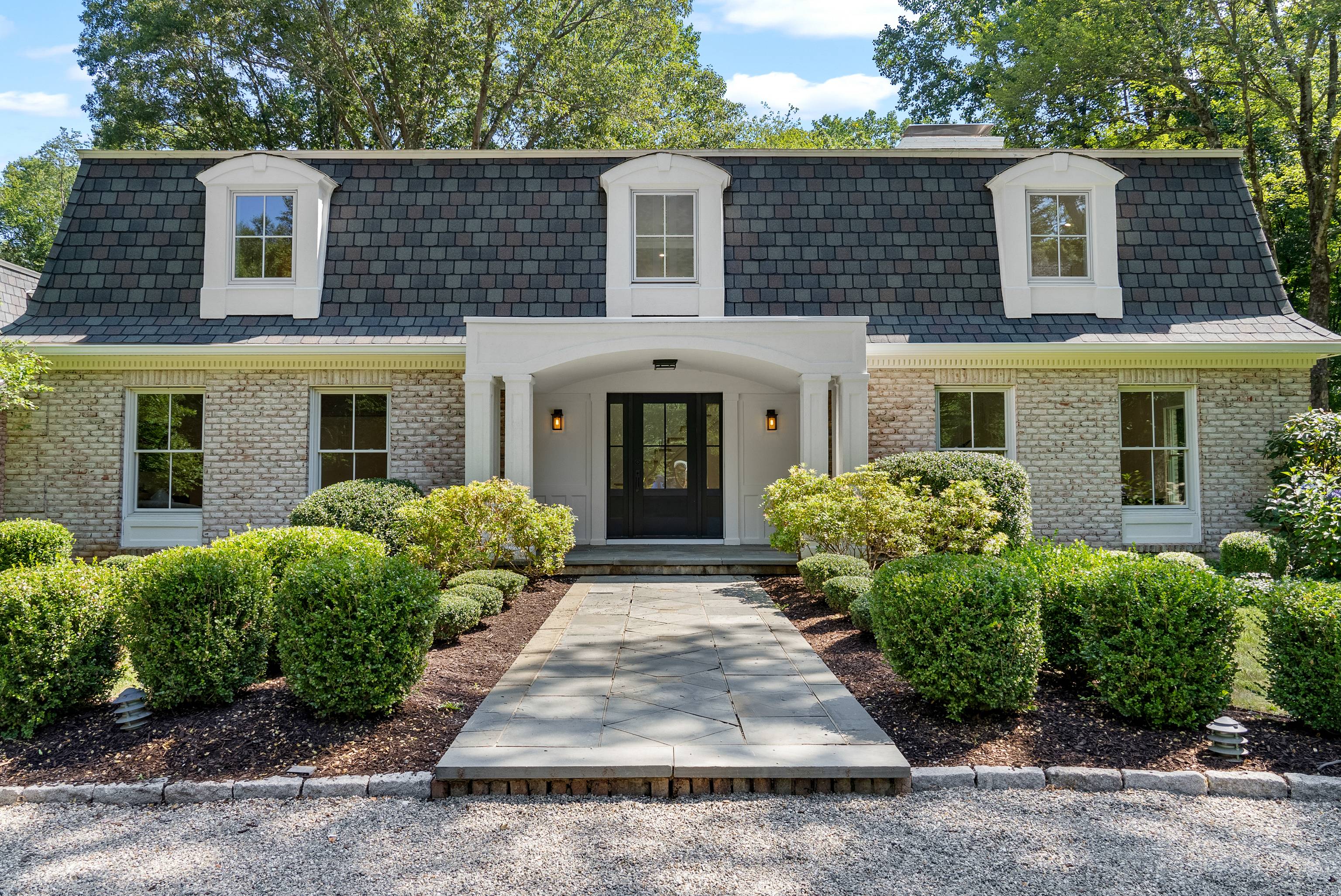 Set on a park like 3 acre level lot this exceptional home blends modern luxury with thoughtful design and quality craftsmanship throughout.