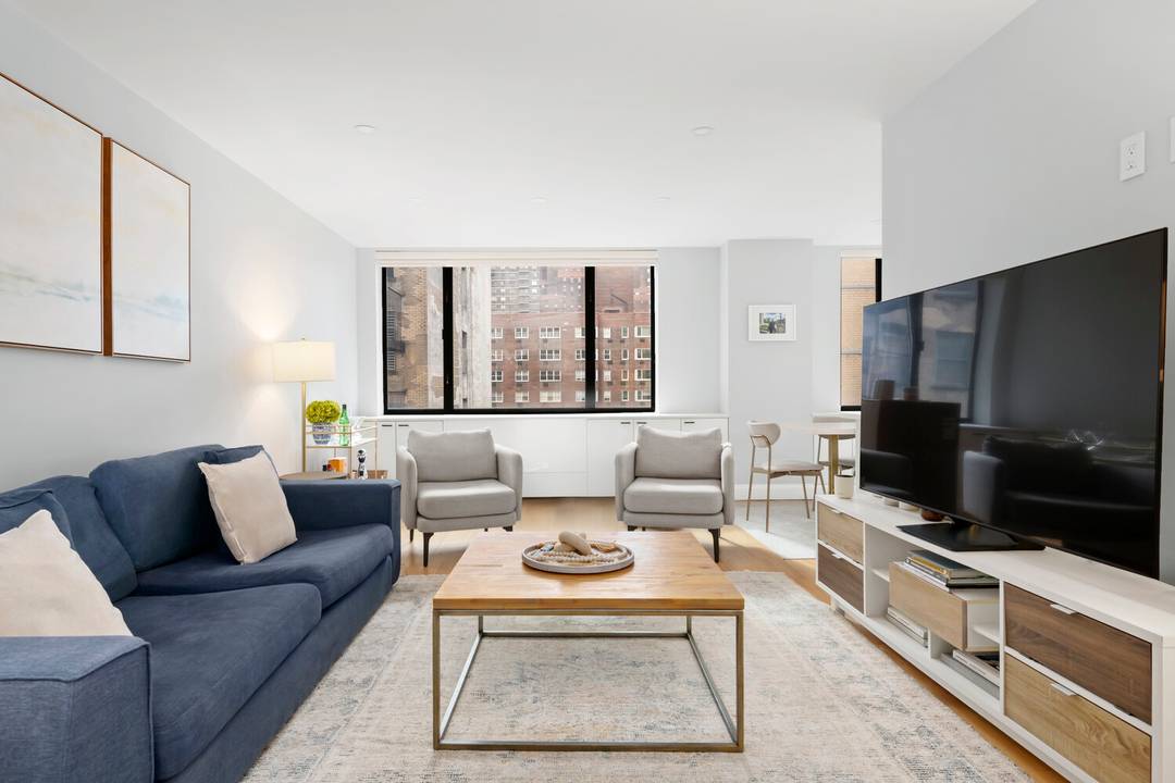 This sun filled, beautifully renovated two bedroom, two bath condominium offers 1, 075 square feet of thoughtfully designed living space.