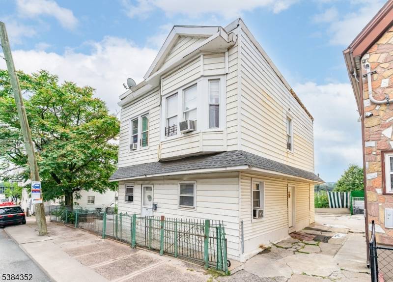 Nestled in a vibrant and convenient neighborhood, this 2 family home offers generous, well designed layouts perfect for comfortable living or investment.