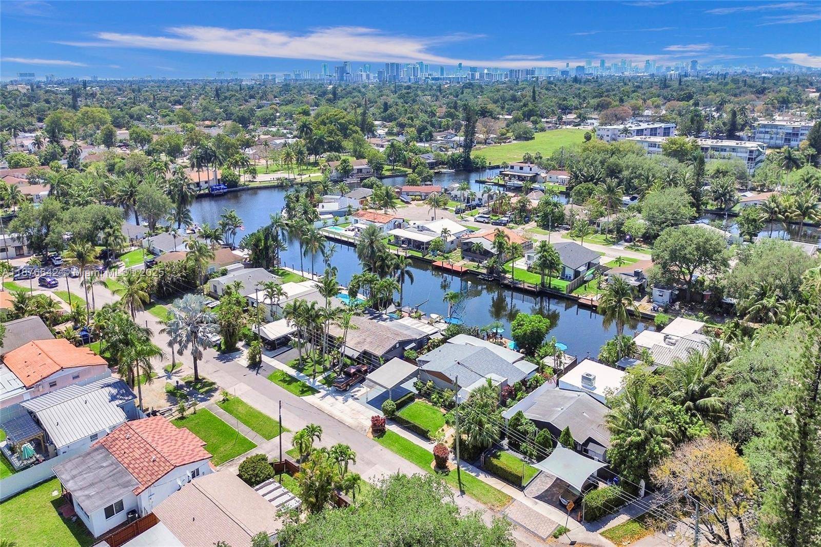 This renovated waterfront residence captures the essence of South Florida living, positioned on a quiet street with a 30 foot private dock and direct ocean access.