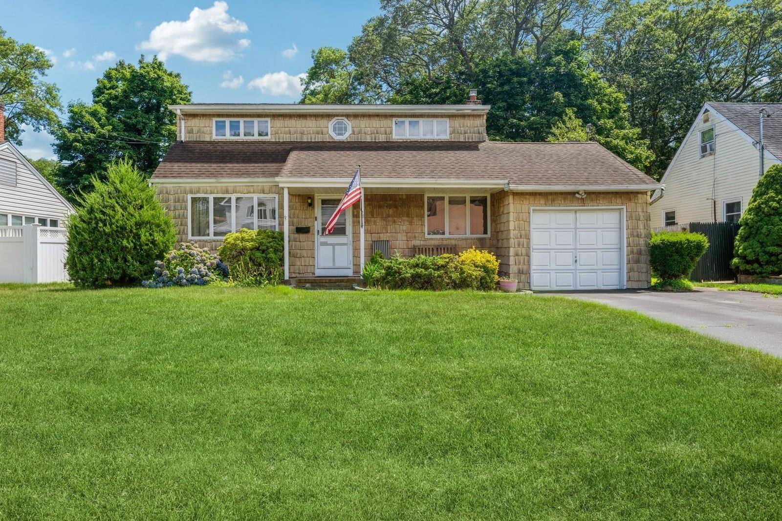Charming 4 Bedroom Expanded Cape with Great Potential.