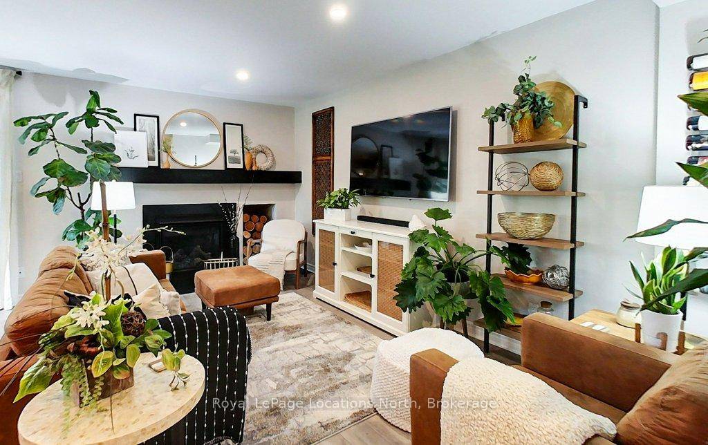 Welcome to this well appointed, tastefully decorated, TURNKEY, two storey townhouse with open concept living and walk outs on both levels.