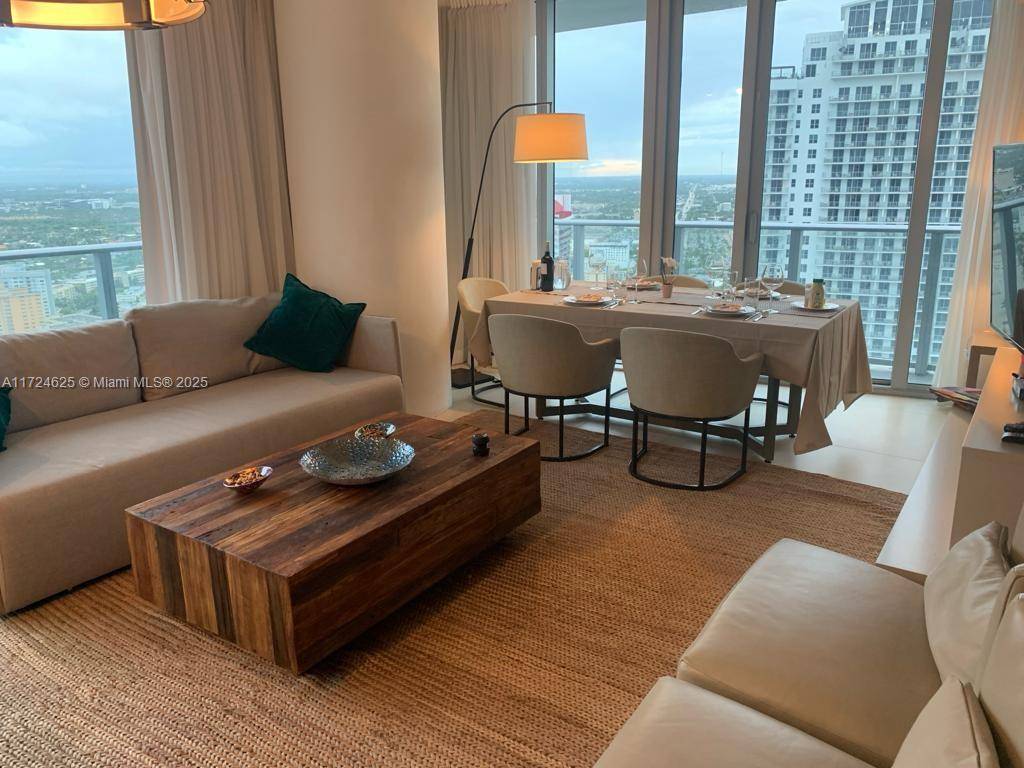 Gorgeous 2 bedroom 2 bath corner unit facing South West with views of the city, intracoastal, beach and more.
