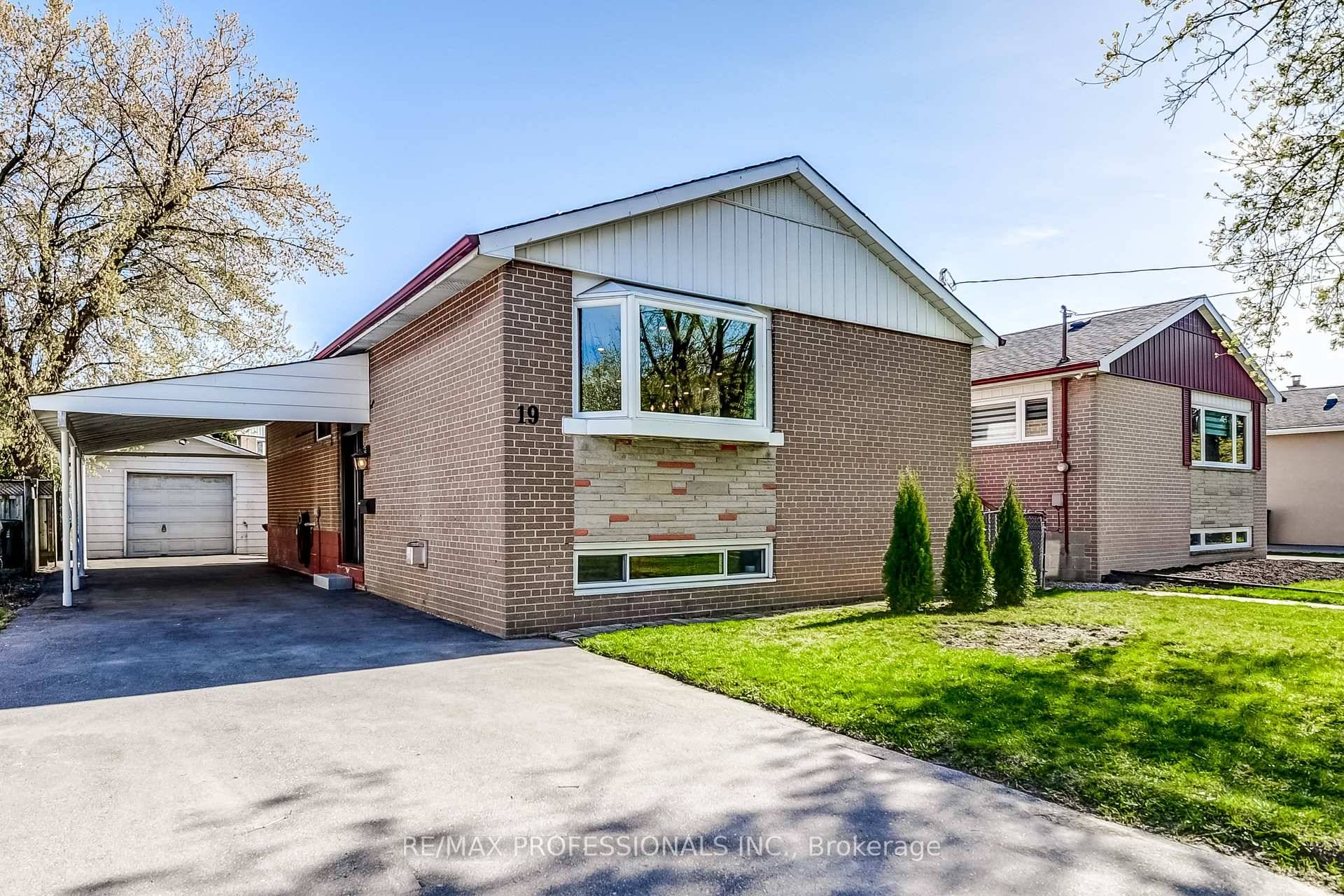 Gorgeous, Renovated Raised Bungalow On A L A R G E 45 by 130 Foot Lot Boasting 3 1 Bedrooms, 2 Bathrooms, Detached Garage and 5 Car Parking !