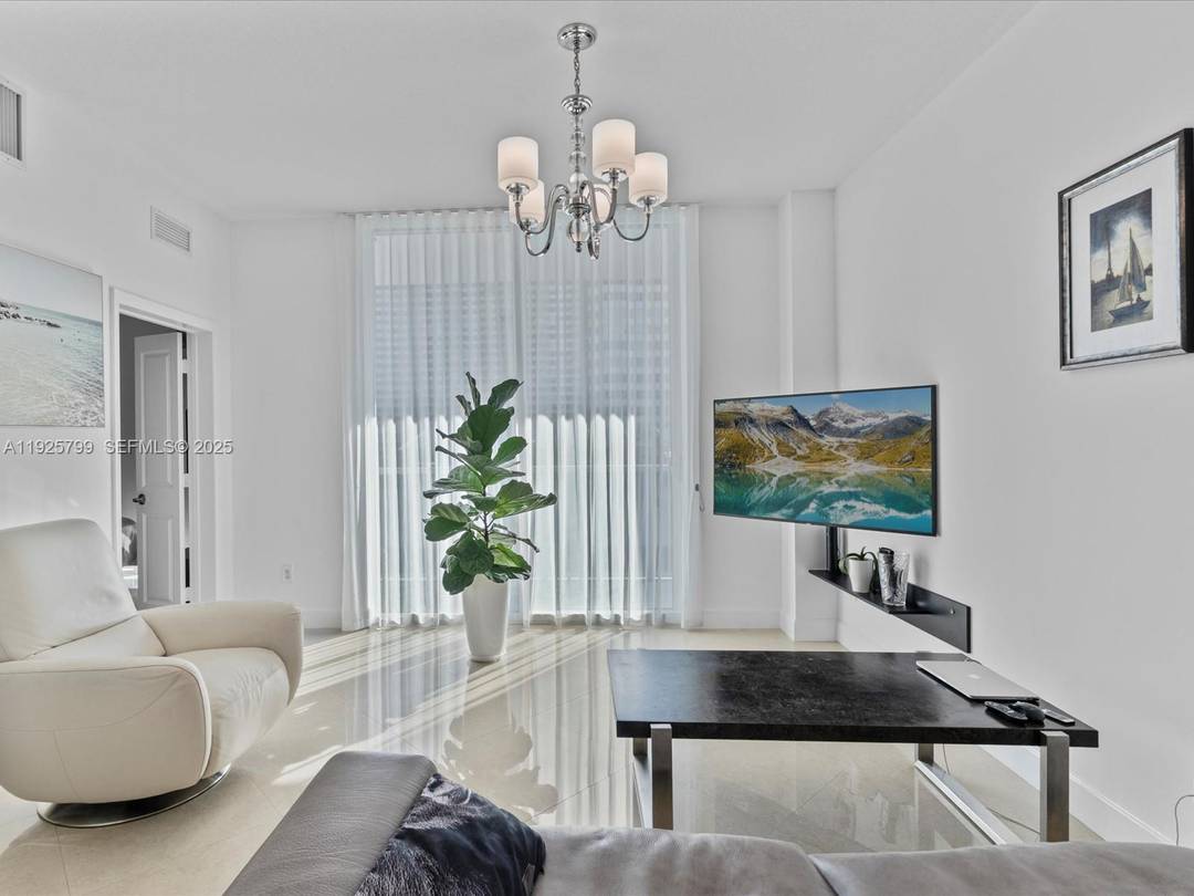 AMAZING DEAL ! Two closed bedroom, high ceilings, across the ocean, newer building with full reserves, 1 assigned parking spot.