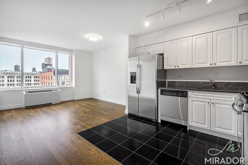 Renovated south facing studio with great natural light on the 18th floor of The Caroline in the heart of Flatiron.