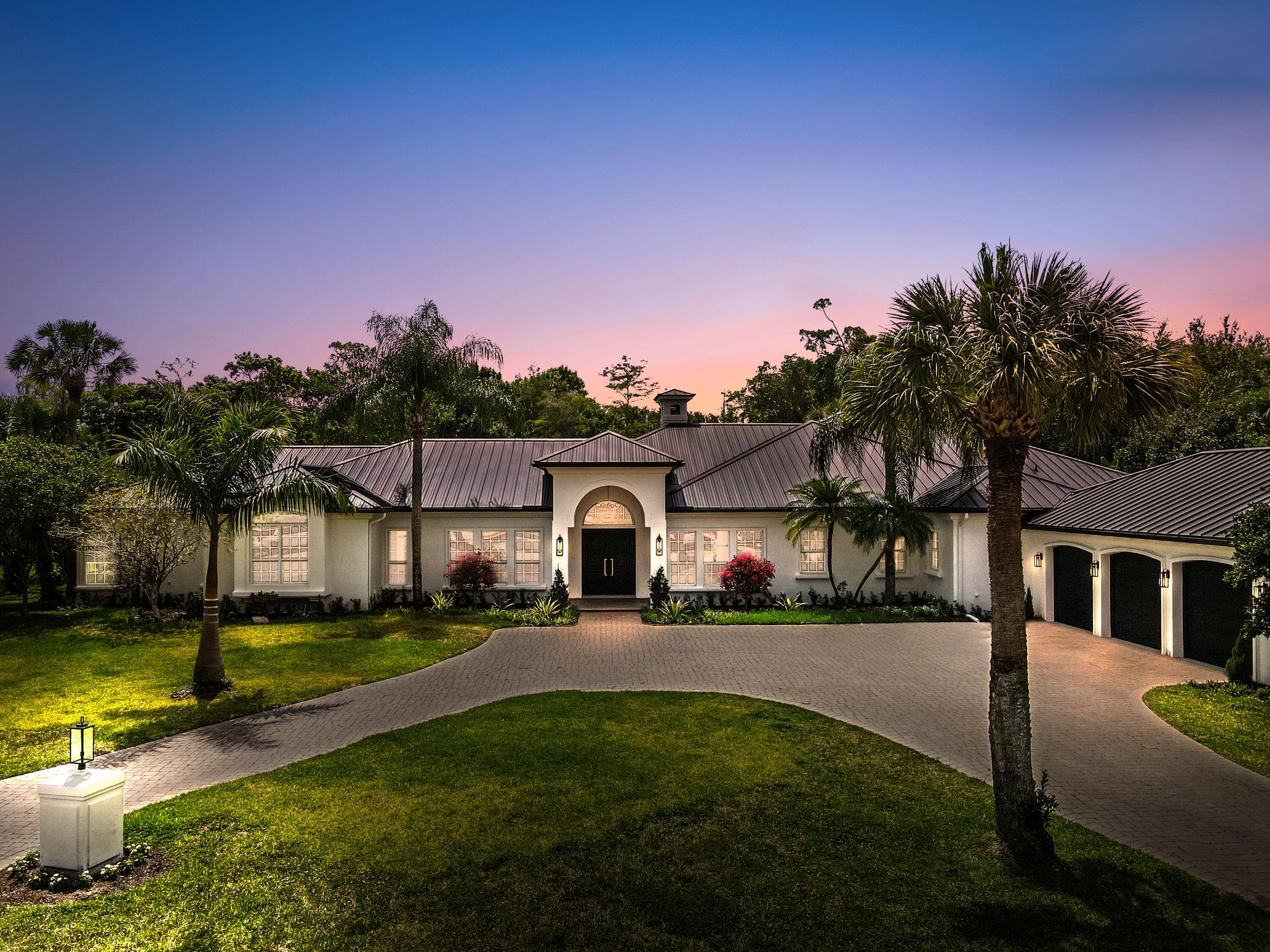 Experience elevated living in this completely renovated luxury estate on a private cul de sac in the heart of Wellington with no HOA.
